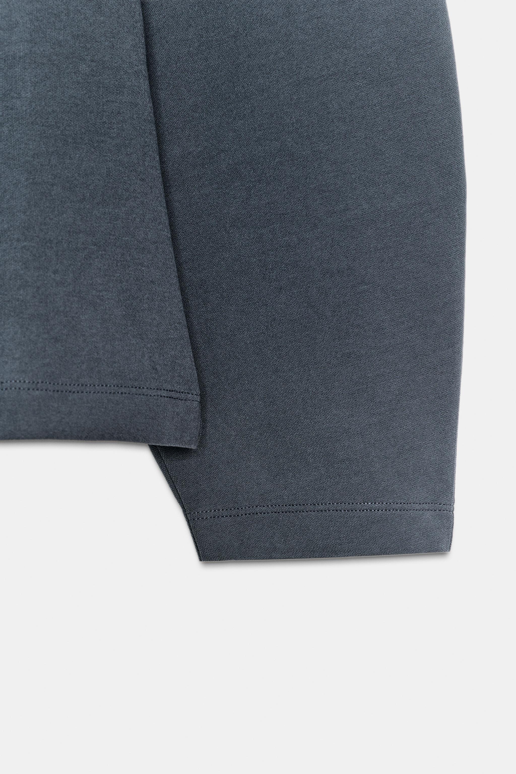 INTERLOCK JUMPER WITH DARTS